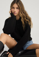 Buzo tejido negro con cuello tipo polo para mujer