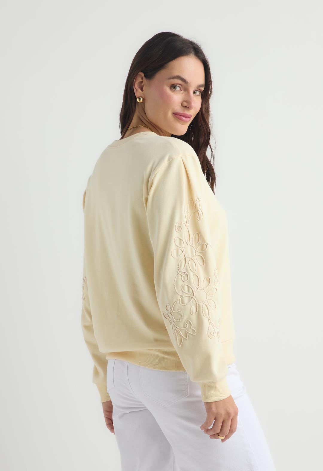 Buzo amarillo con detalle en mangas para mujer