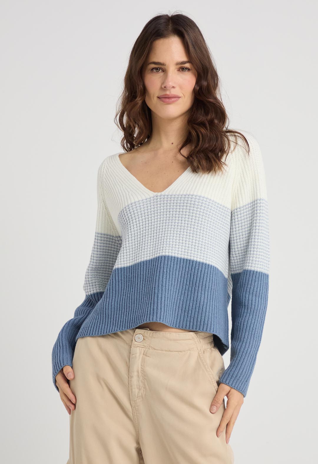 Buzo marfil con franjas para mujer