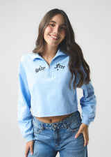 Buzo azul claro con cuello de tortuga para jóvenes