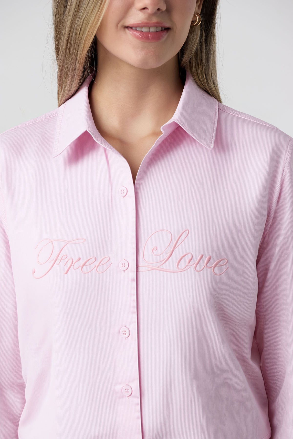 Camisa a rayas rosa claro para jóvenes