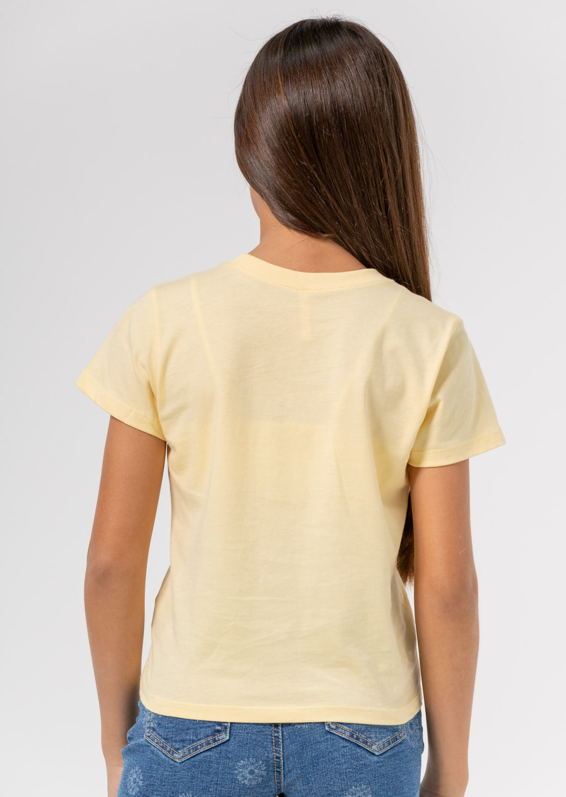 Camiseta amarillo pastel con frente estampado para niñas