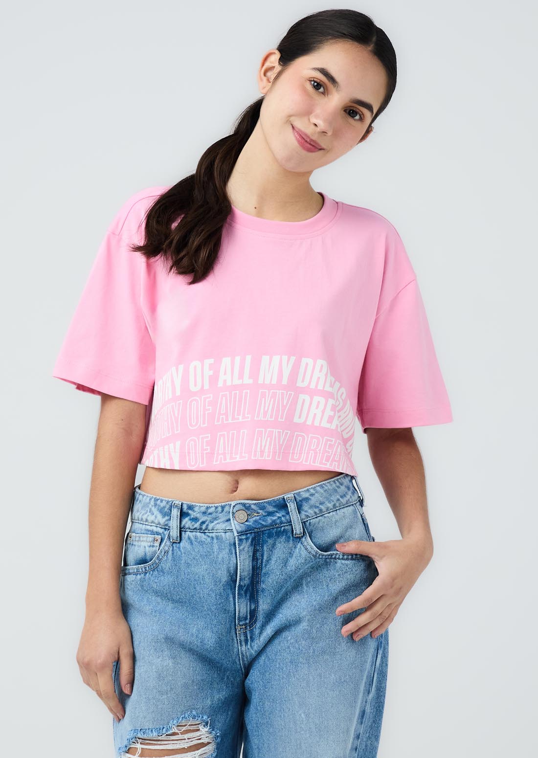 Camiseta rosa medio estampada en ruedo para jóvenes