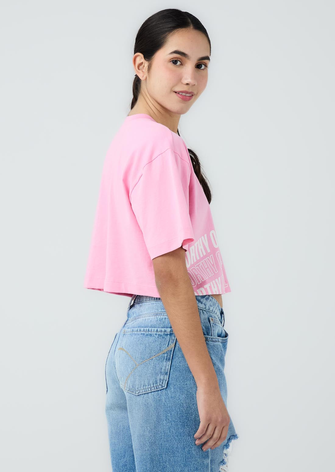 Camiseta rosa medio estampada en ruedo para jóvenes