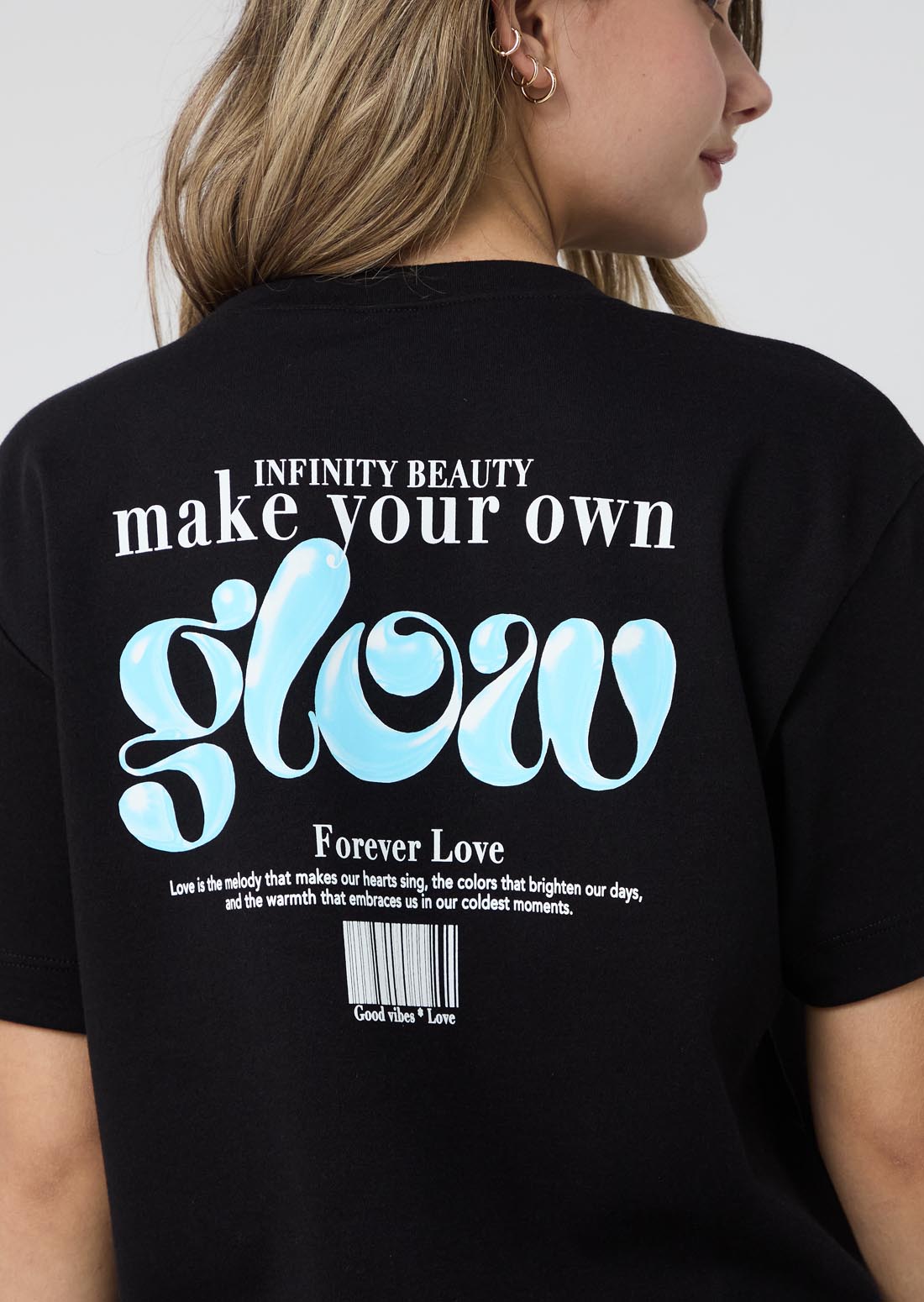 Camiseta oversize negra estampada para jóvenes