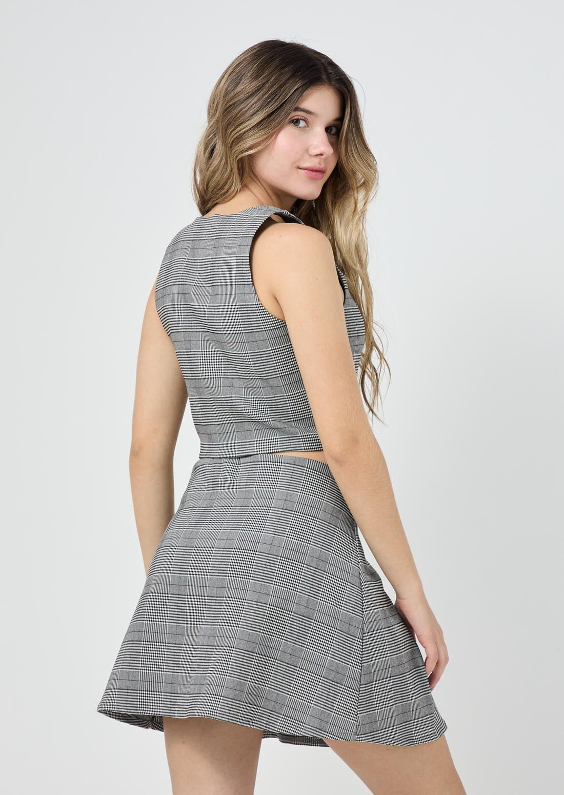 Chaleco negro de cuadros para jóvenes