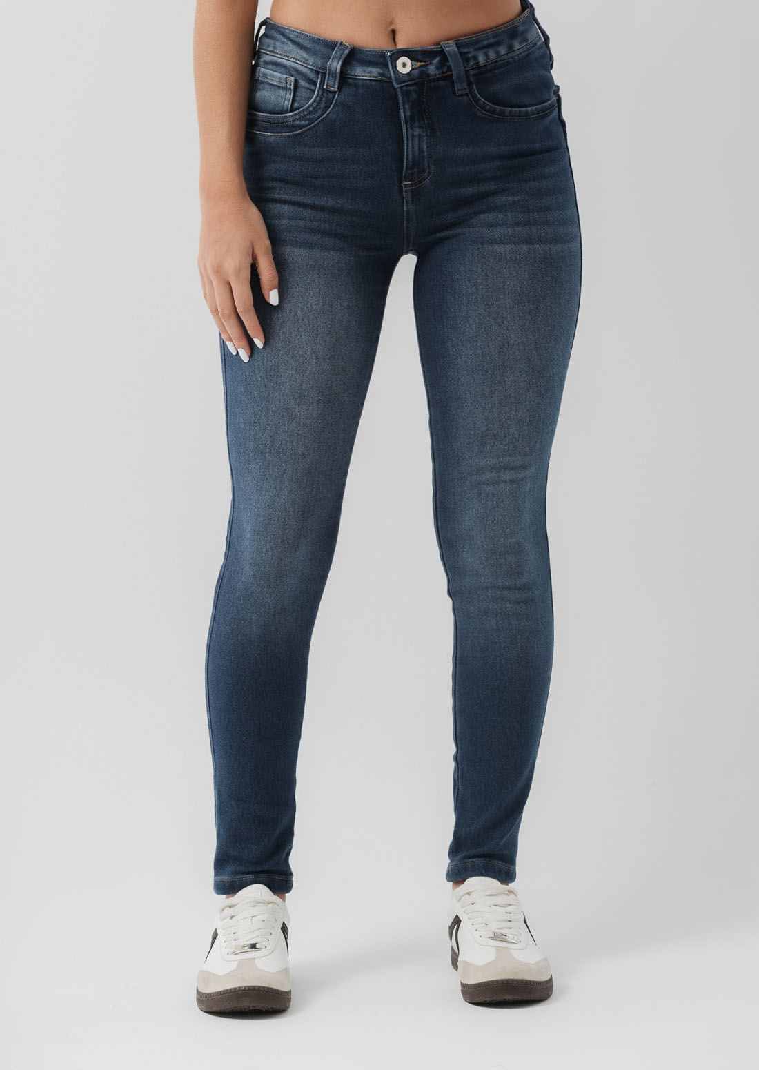 Jean crazy medio oscuro con bota tubo para jóvenes