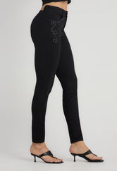 Jean levantacola negro con aplique en frente para mujer