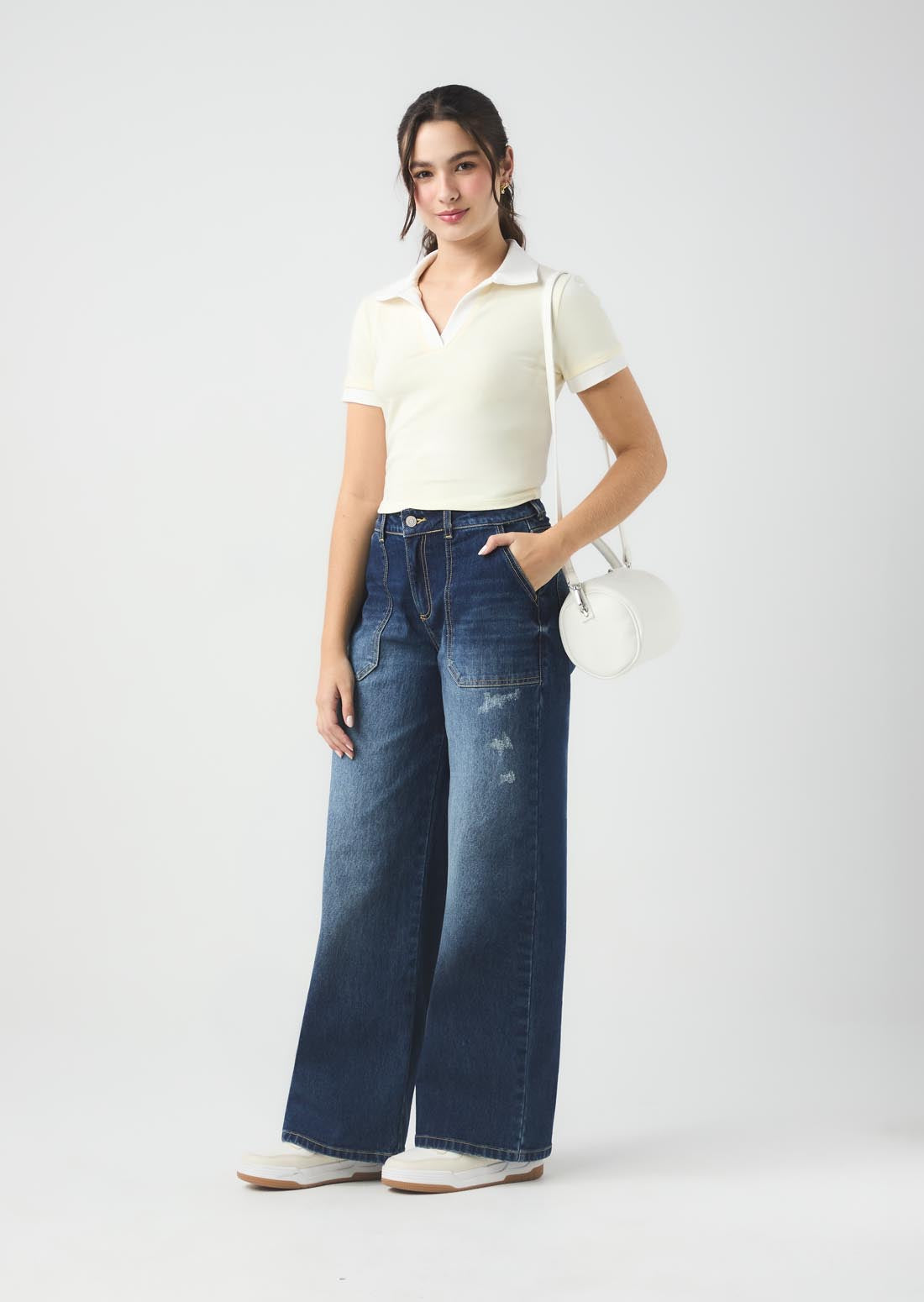 Jean retromom medio oscuro con bota recta para jóvenes