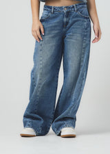 Jean maxi retro tono medio con cortes verticales para jóvenes