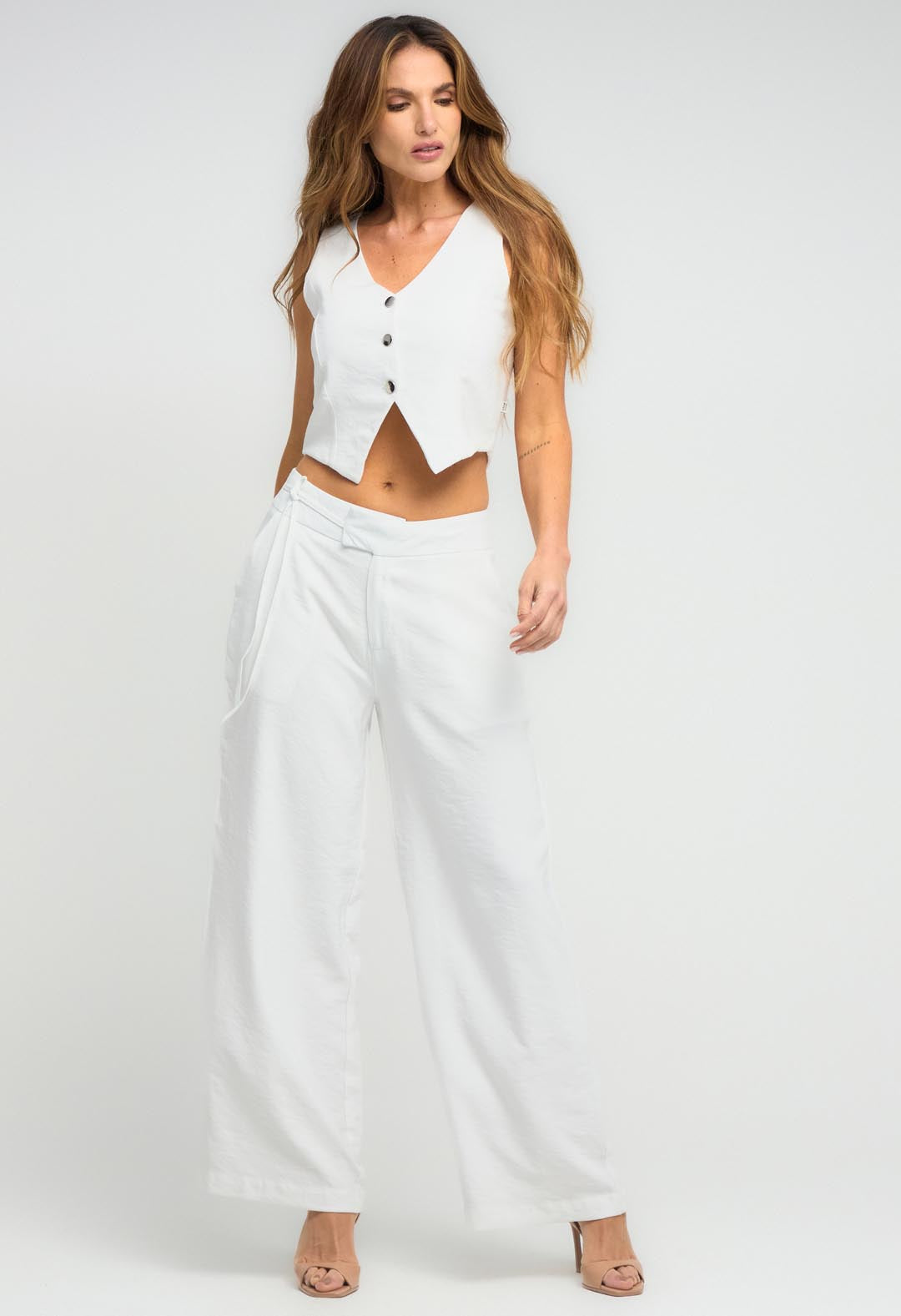 Pantalón marfil con amarre lateral para mujeres