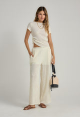Pantalón marfil con cortes para mujer