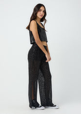Pantalón negro con abertura en costados para jóvenes