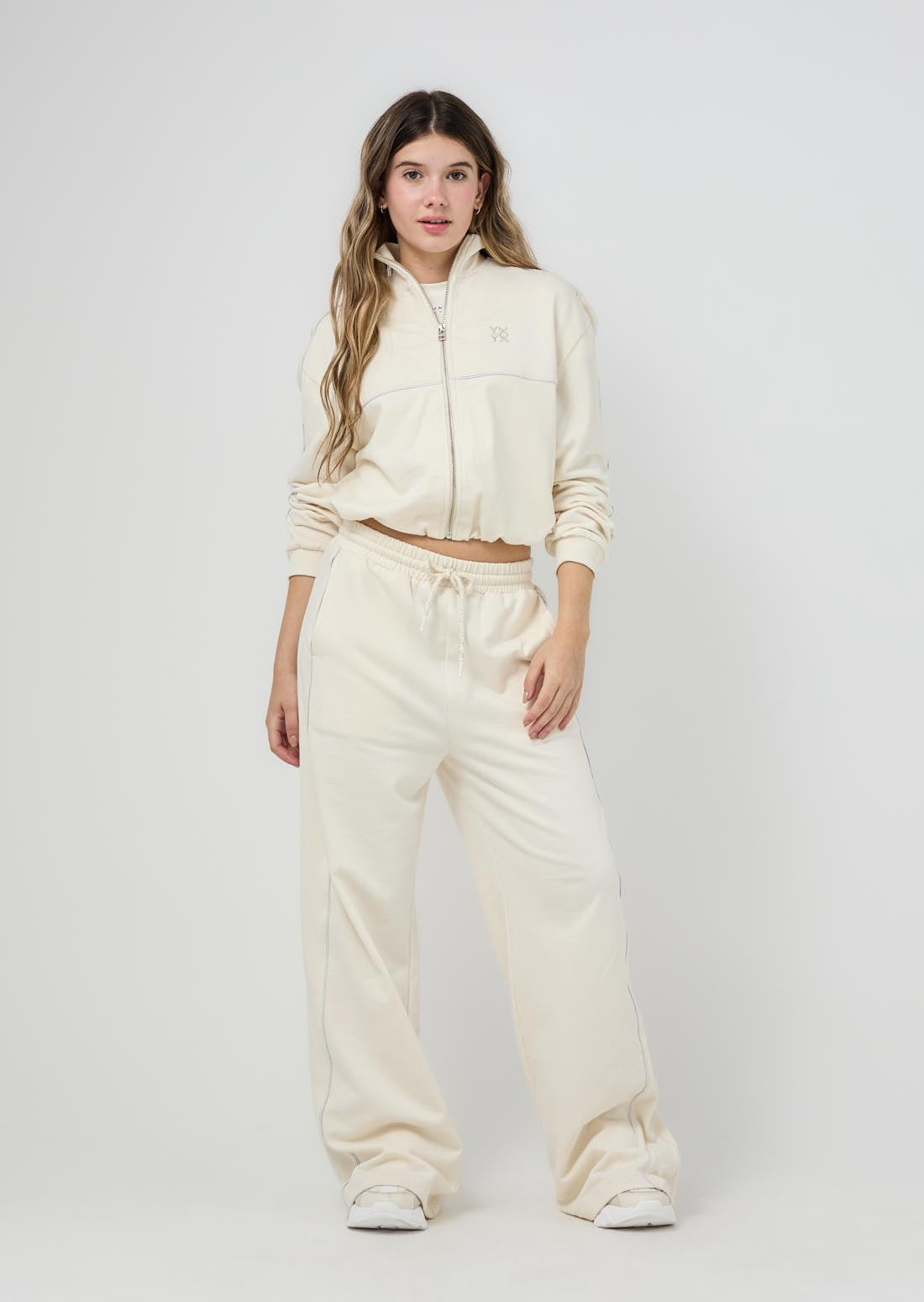 Pantalón beige con sesgo decorativo para jóvenes