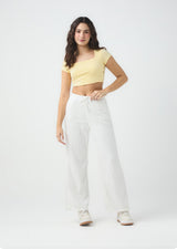 Pantalón marfil con pretina elástica para jóvenes