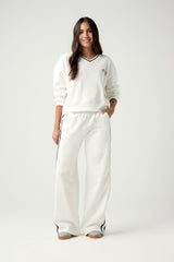 Pantalón marfil con sesgos en contraste para jóvenes