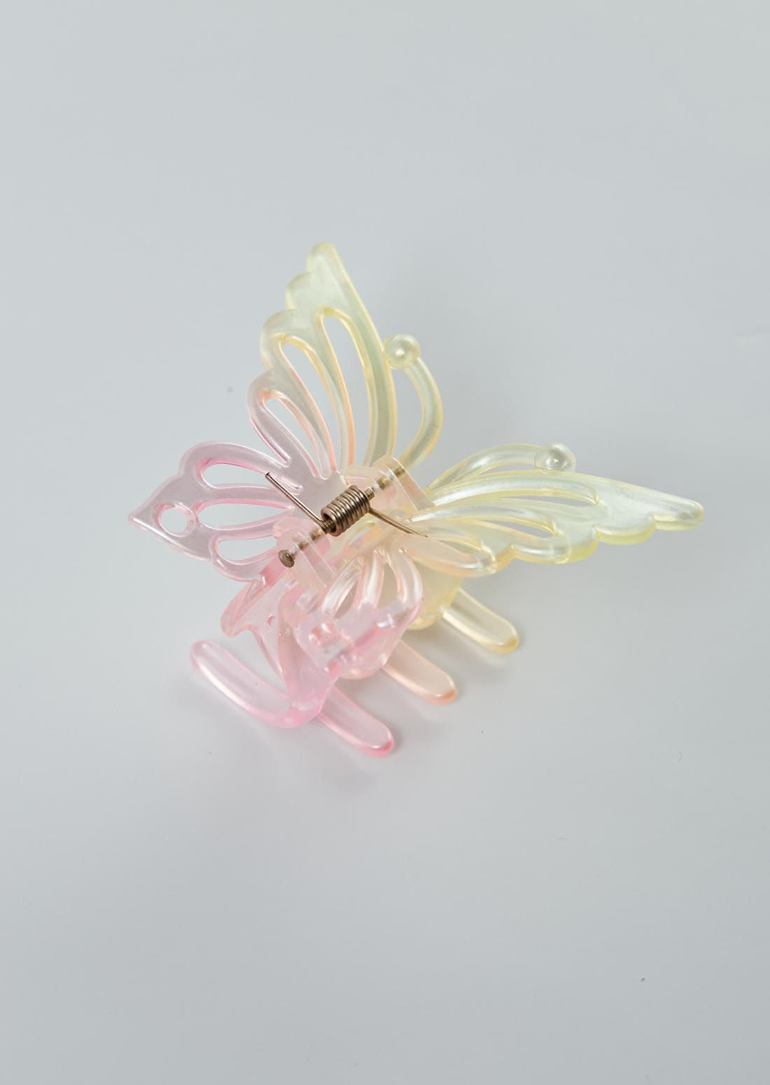 Pinza en forma de mariposa para jóvenes