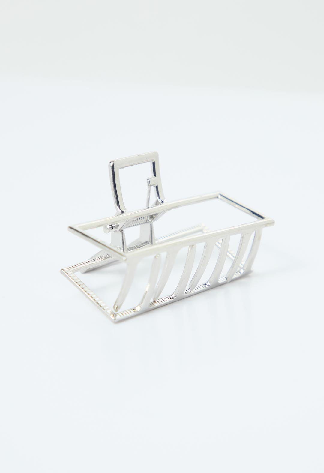 Pinzas plateadas metálicas para el cabello