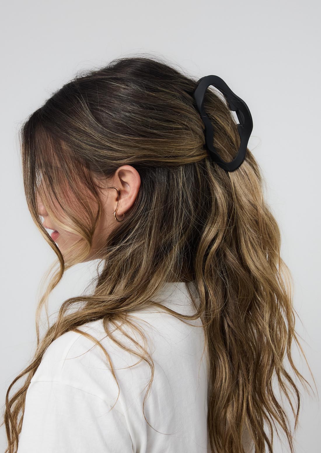 Pinza negra con acabado mate para jóvenes