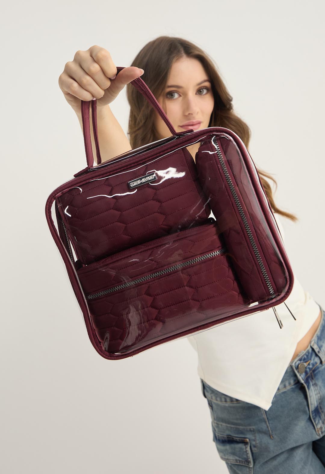 Set viajero de cosmetiqueras vino